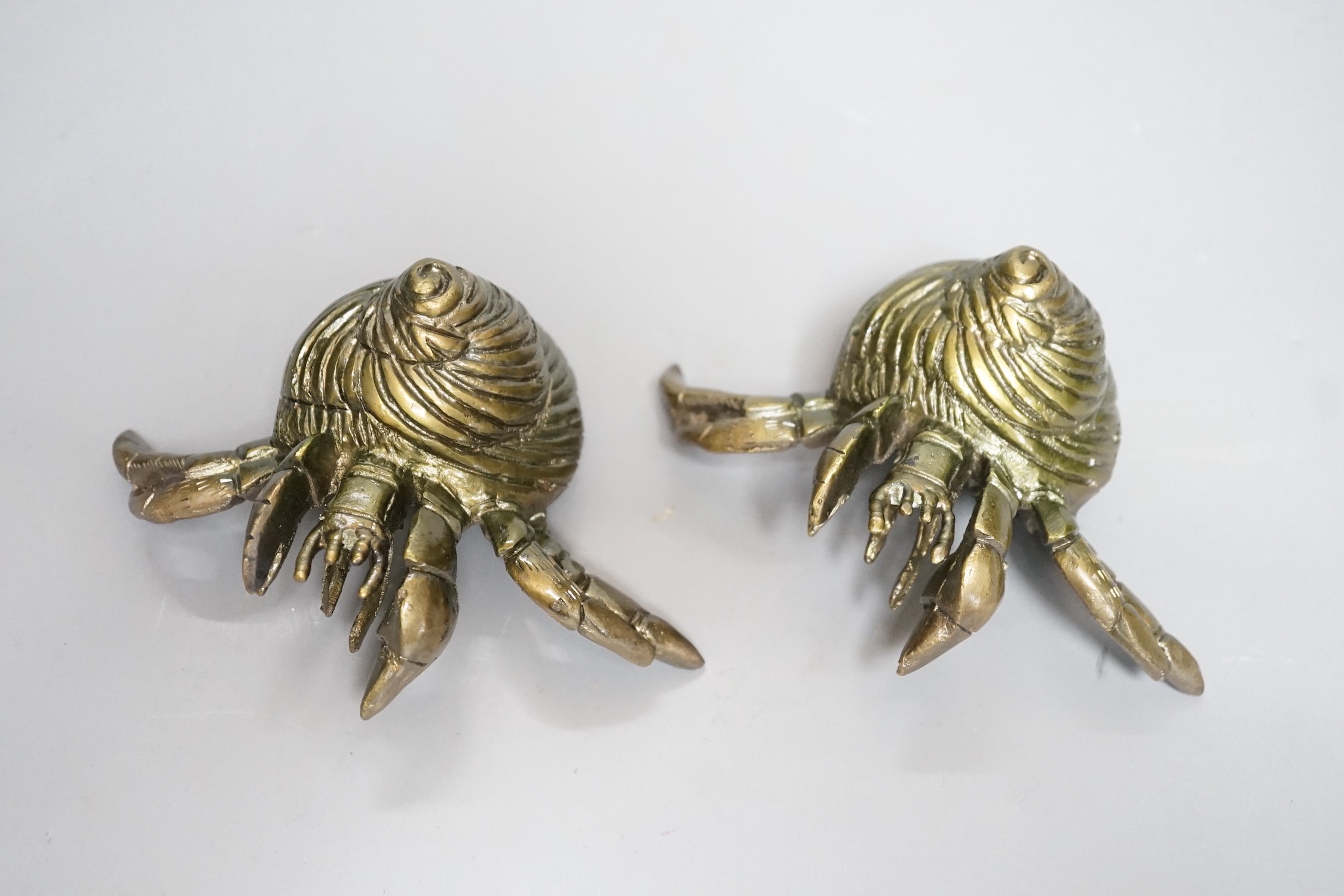 Two modern bronze models of hermit crabs, 14.5cm
